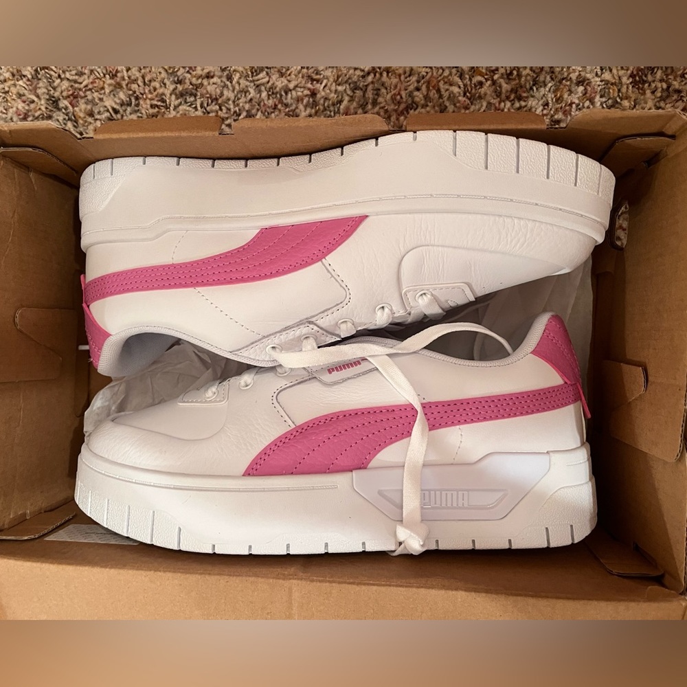 women’s pink puma’s, size 9, never worn brand new in box.